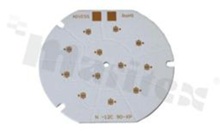MCPCB, thermal conductivity 2W/(m*K), thickness: 1.6mm, number of layers - 1, copper layer thickness 35um, white soldermask, legend color: gold, size: diameter 90mm, pad cover: gold; for XP/XT LEDs, /12