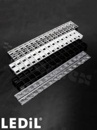Soczewka do diod LED mid power; kąt rozsyłu: 58 do 69 stopni FWHM; ilość diod: 28; rozmiar: 280x21mm; wysokość: 13.3mm; rodzaj materiału: PMMA; sposób mocowania: kołek; śruby; zatrzaski