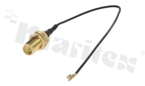 Antenna connecting cable; RG1.13; grey; 70mm cable length; IPX (U.FL) to reverse SMA RP