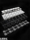 Soczewka do diod LED mid power; kąt rozsyłu: 35 stopni FWHM; ilość diod: 7; rozmiar: 280x40mm; wysokość: 20.3mm; rodzaj materiału: PMMA; sposób mocowania: kołek; śruby; klipsy